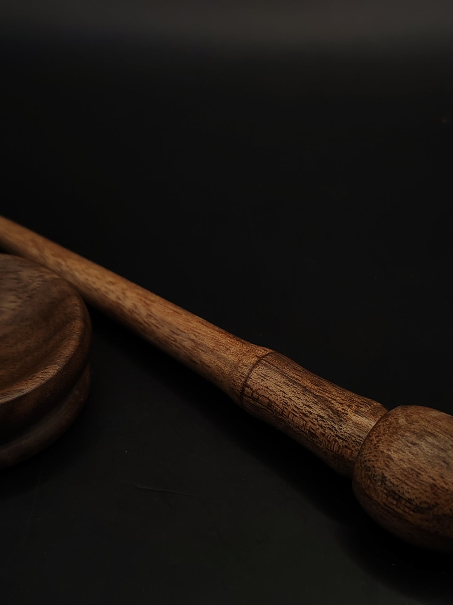 An ultra-light 7 g walnut mini support spindle with a matching tiny spinning bowl — perfect for cotton, fine yarns, travel spinning, or collectors.