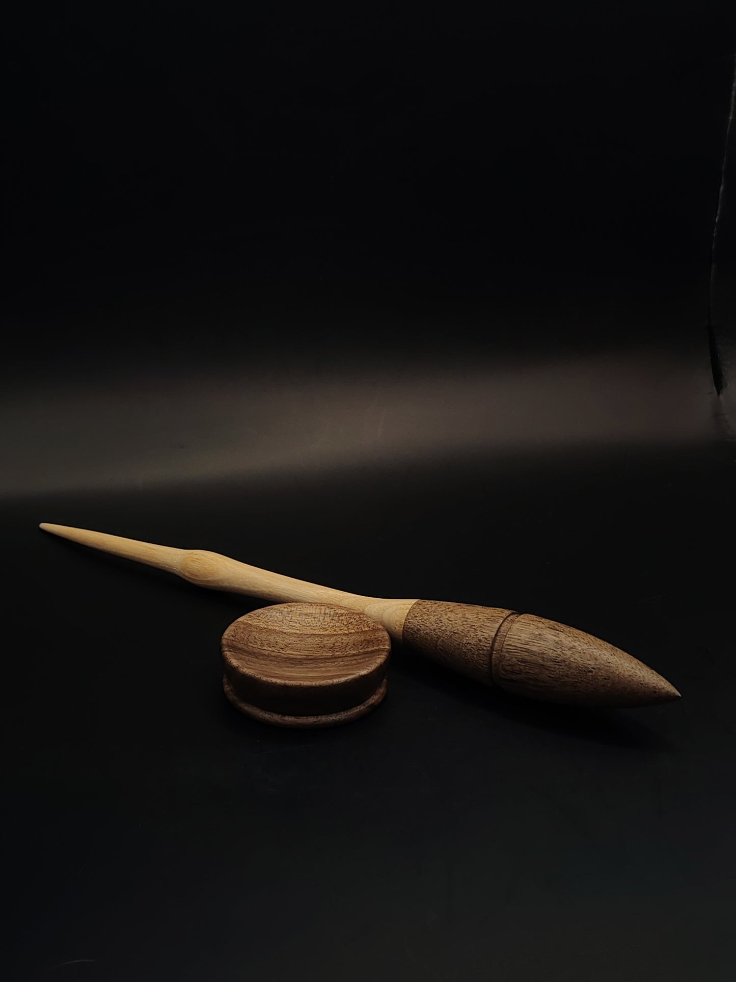 Elegant goddess spindle design with smooth chestnut wood and sculpted walnut whorl